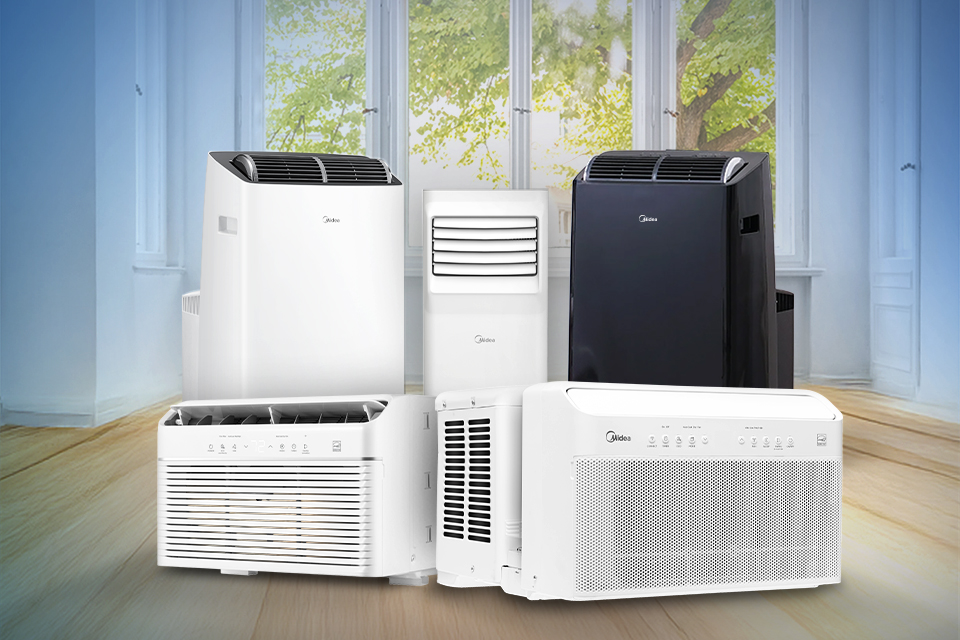 Wall-mounted Midea mini-split indoor unit cooling a bright residential living space with a person seated below